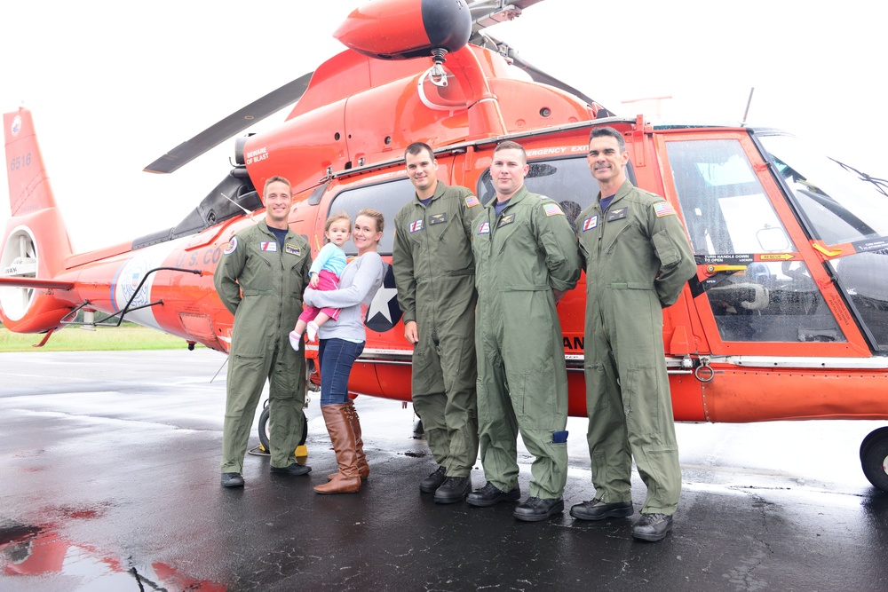 Coast Guard rescues stranded mother, infant from flooded house