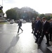 Secretary of defense walks to the CESEDEN