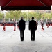 Secretary of defense, Spain's MOD stand at attention during honors, wreath-laying ceremony