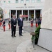 SD bows his head after placing a wreath during honors, wreath-laying ceremony