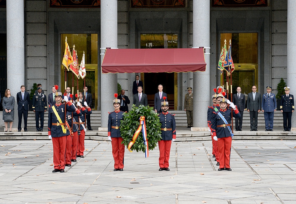 SD and Spain's MOD watch as the wreath is being guided to the front of the memorial