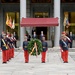 SD and Spain's MOD watch as the wreath is being guided to the front of the memorial