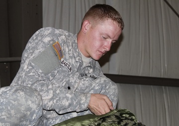 Lifeliners prepare aerial delivery bundles at JRTC