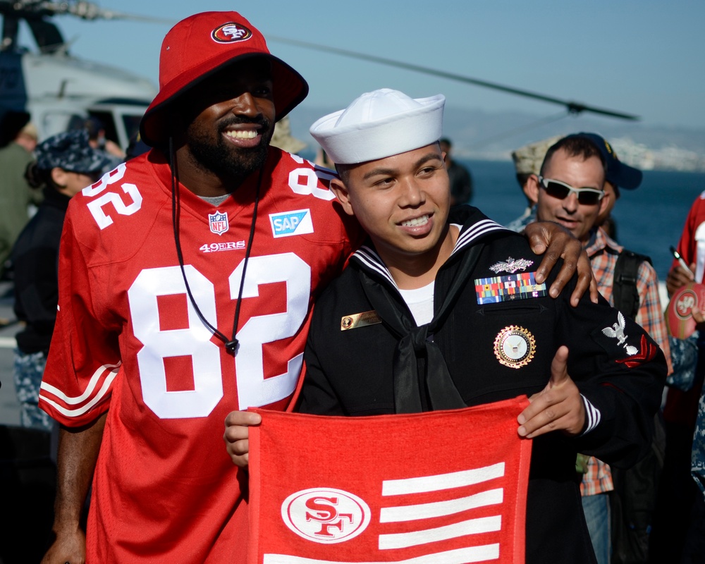 Torrey Smith poses for photos aboard USS Somerset