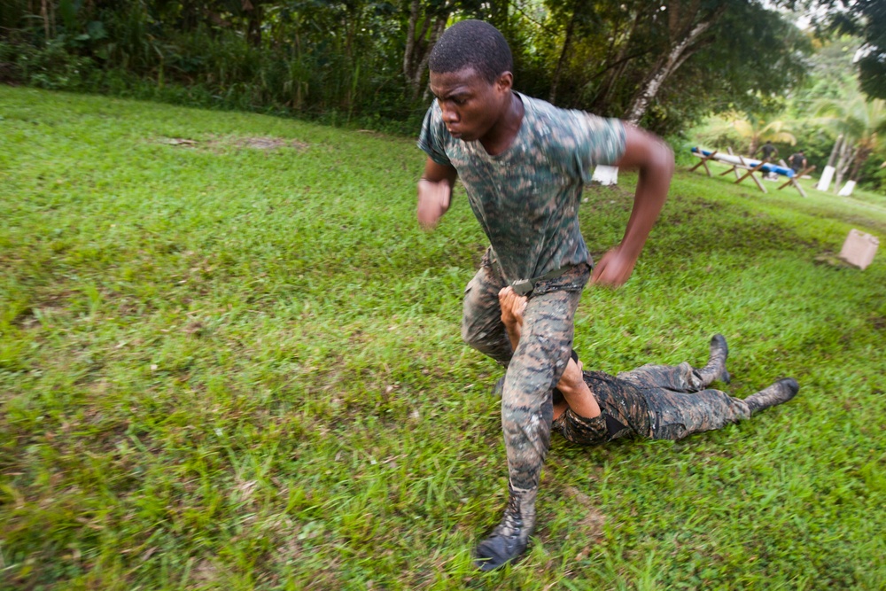 U.S. Marines with SCT-Guatemala, SPMAGTF-SC, lead the Brigada de Infanteria Marina in physical training