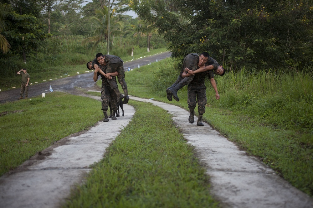 U.S. Marines with SCT-Guatemala, SPMAGTF-SC, lead the Brigada de Infanteria Marina in physical training