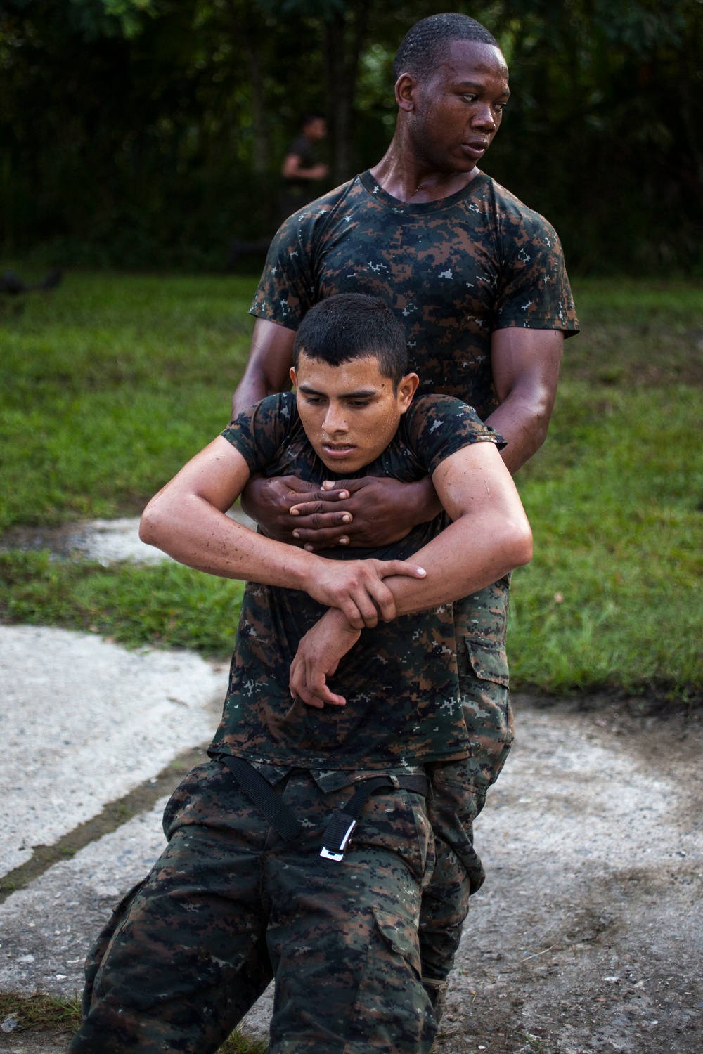 U.S. Marines with SCT-Guatemala, SPMAGTF-SC, lead the Brigada de Infanteria Marina in physical training