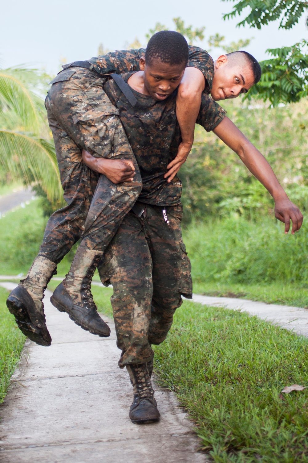 U.S. Marines with SCT-Guatemala, SPMAGTF-SC, lead the Brigada de Infanteria Marina in physical training