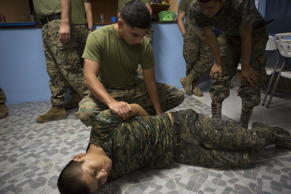 U.S. Marines with SCT-Guatemala, SPMAGTF-SC, lead the Brigada de Infanteria Marina in physical training