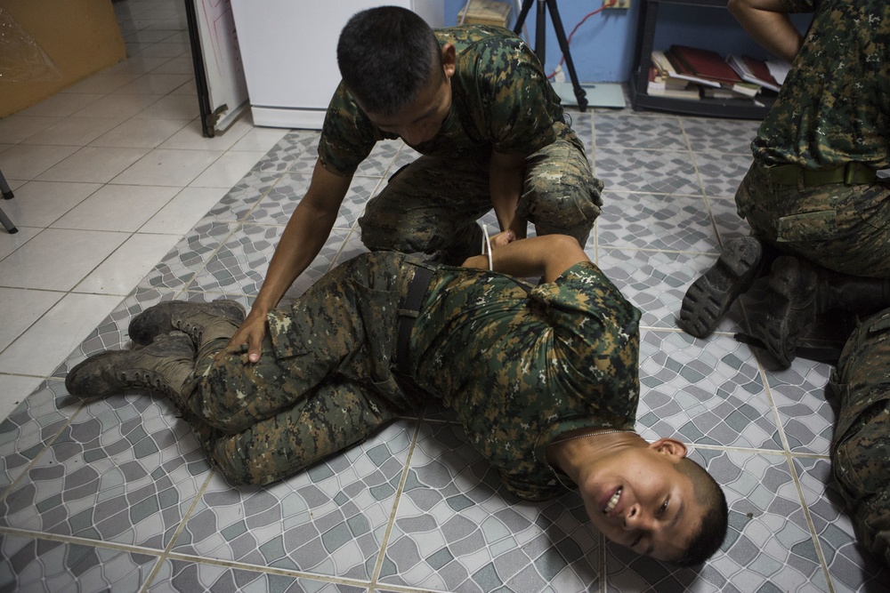 U.S. Marines with SCT-Guatemala, SPMAGTF-SC, lead the Brigada de Infanteria Marina in physical training