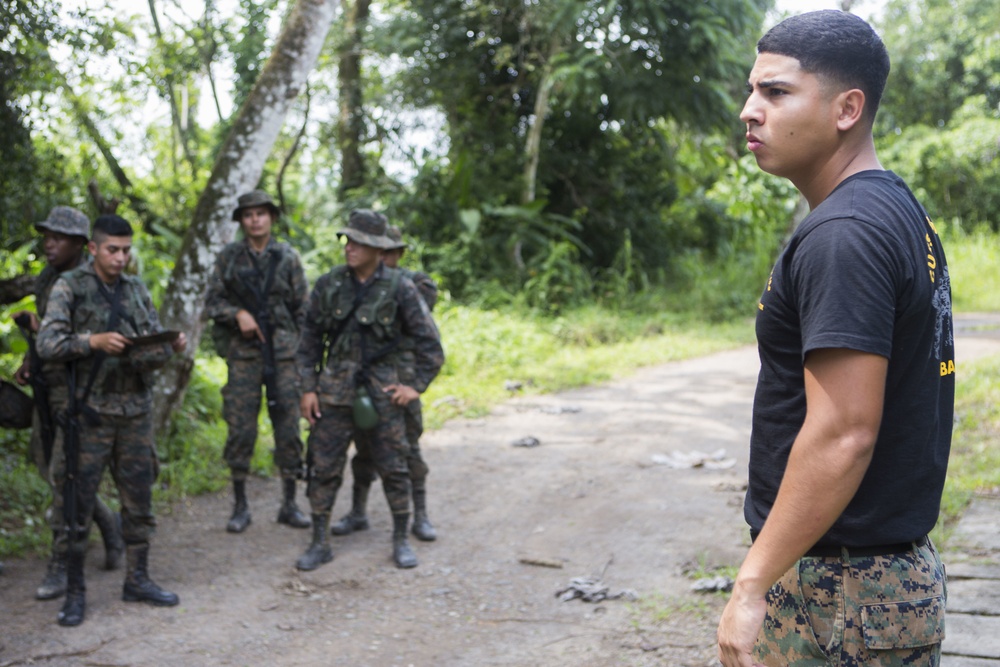 U.S. Marines with SCT-Guatemala, SPMAGTF-SC, teach room clearing tactics to the Brigada de Infanteria Marina