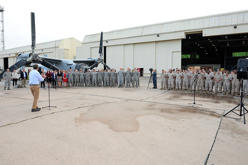 Secretary of defense speaks with airmen and marines during a troop event at Moron Air Base