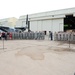 Secretary of defense speaks with airmen and marines during a troop event at Moron Air Base