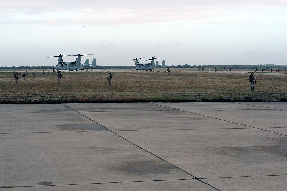 Secretary of defense observes an airfield seizure bilateral exercise