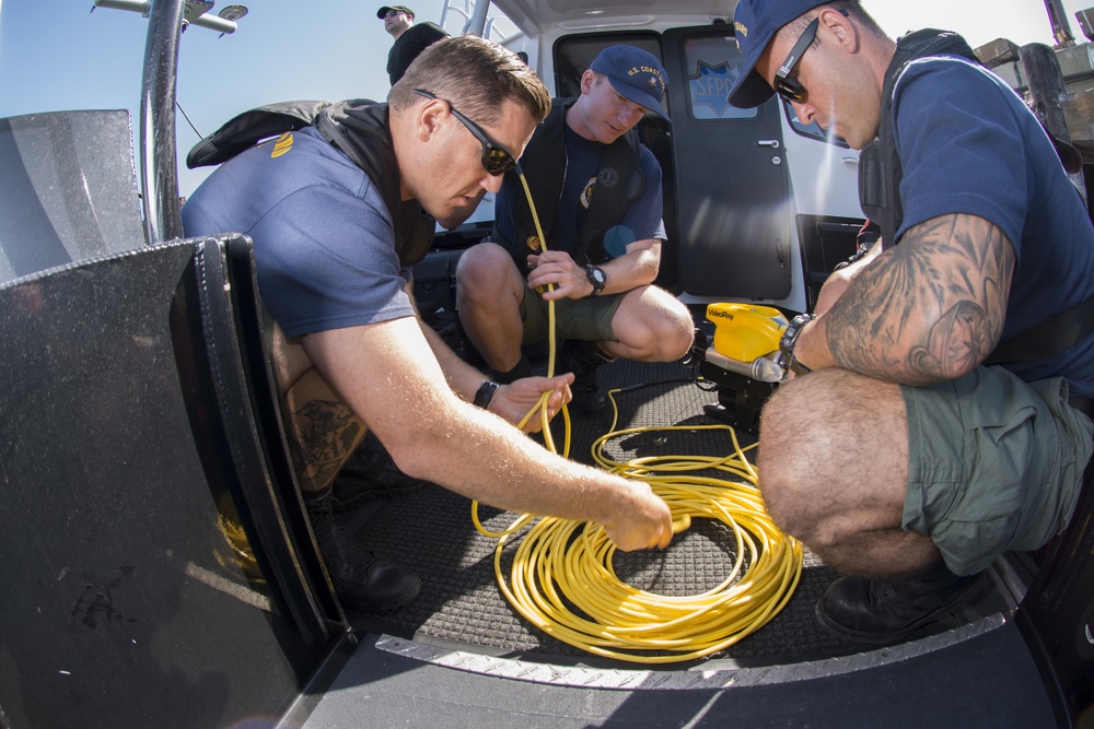 Coast Guard divers conduct Fleet Week pier sweeps