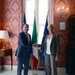 Secretary of defense and Italian Defense Minister Roberta Pinotti shake hands at the Quirinal Palace