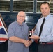 Retired MOD employee receives medal for more than 30 years’ service