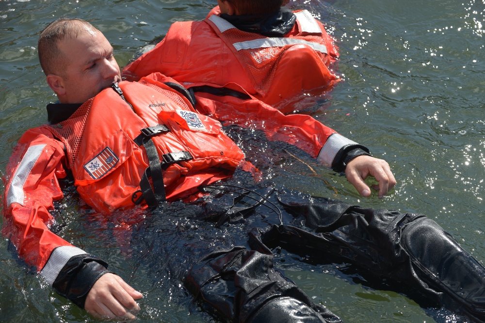 Coast Guard Station New York crew members test immersion suits
