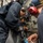 USS Rushmore Sailors sample diesel engine lube oil