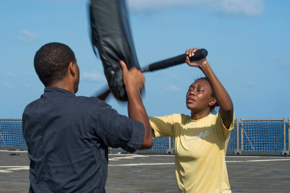 USS Rushmore Sailors participate in OC spray security reaction force basic training