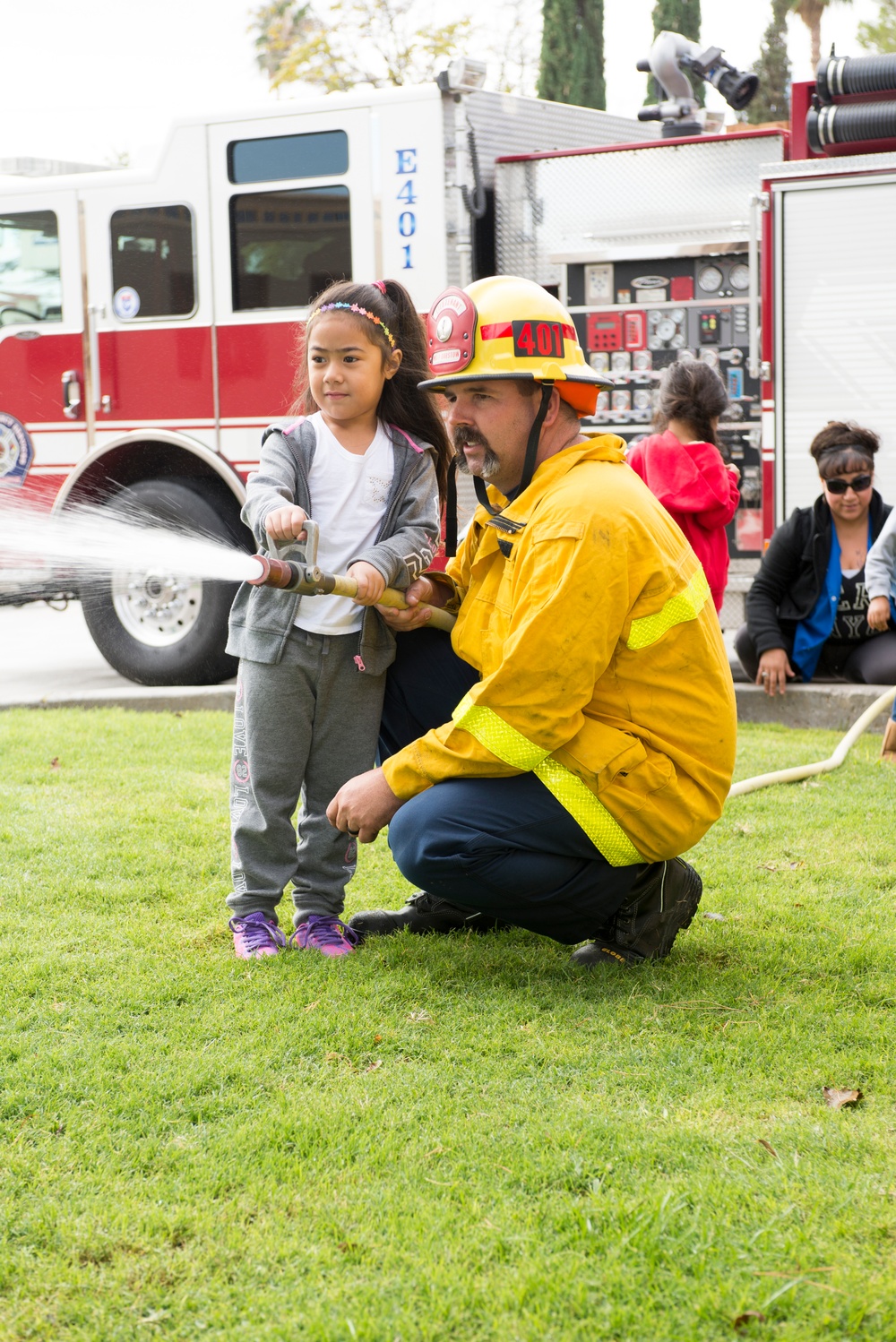 Firefighters entertain and educate children aboard MCLB Barstow