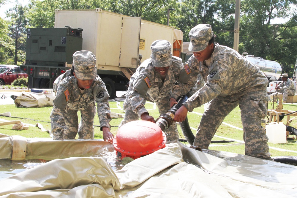 Soldiers provide water to citizens, hospital