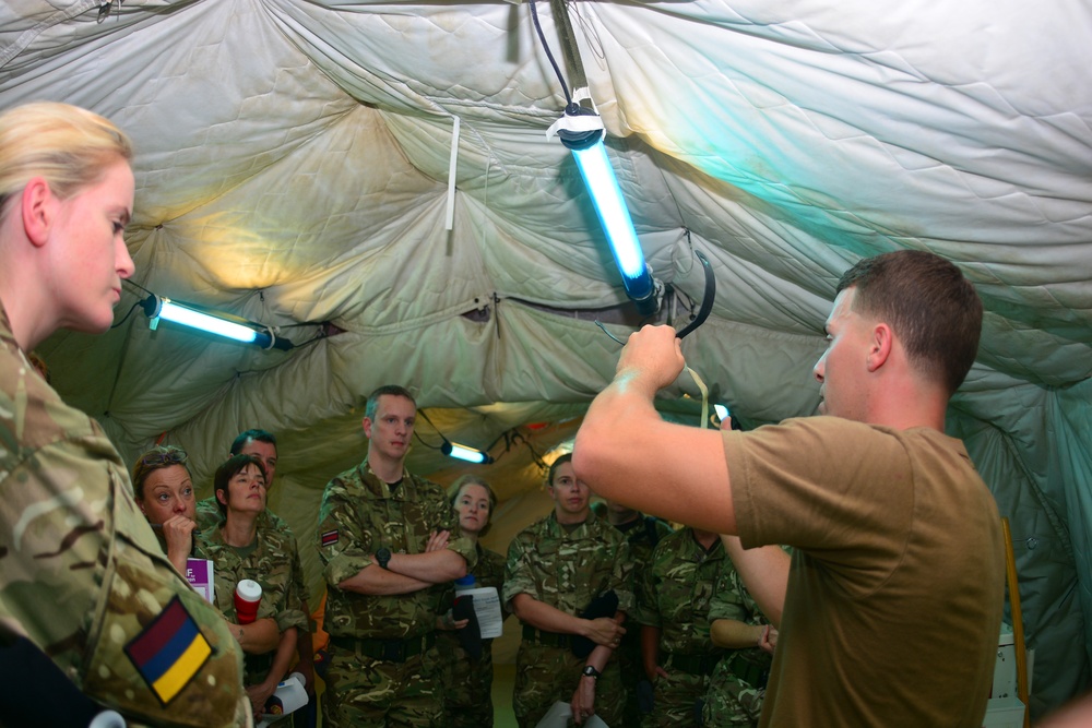US Navy sailors train British Army soldiers in expeditionary medical training