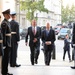Secretary of defense is greeted by Secretary of State for Defense Michael Fallon at the Ministry of Defense