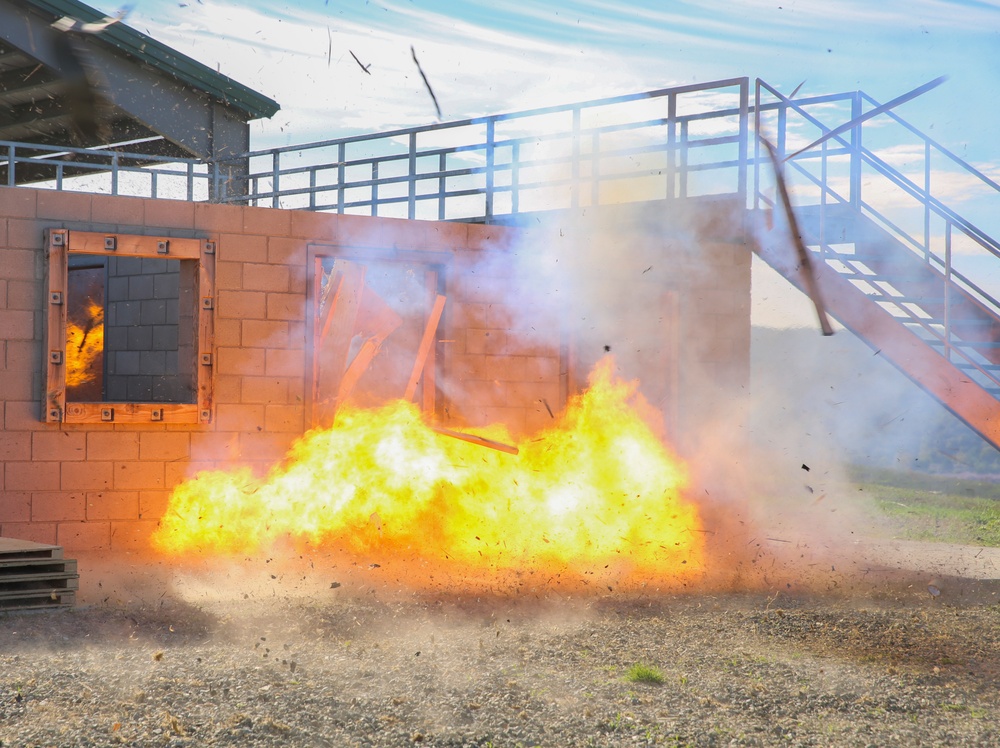 Marines blow the door off its hinges
