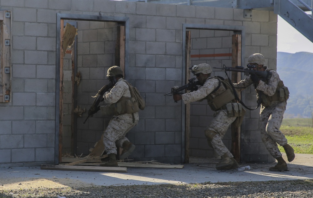 Marines blow the door off its hinges