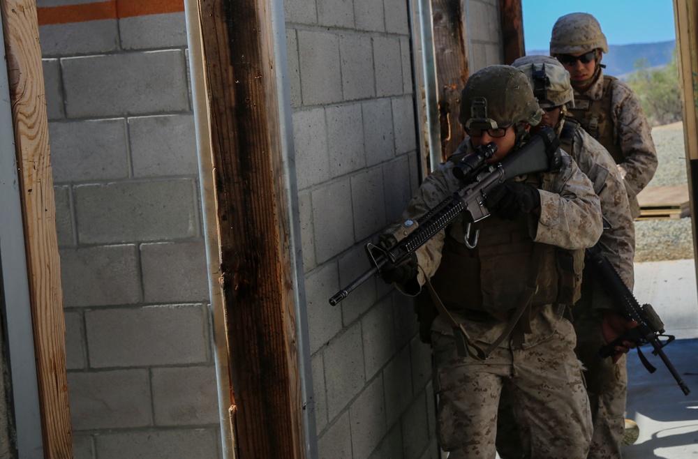 Marines blow the door off its hinges