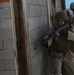 Marines blow the door off its hinges