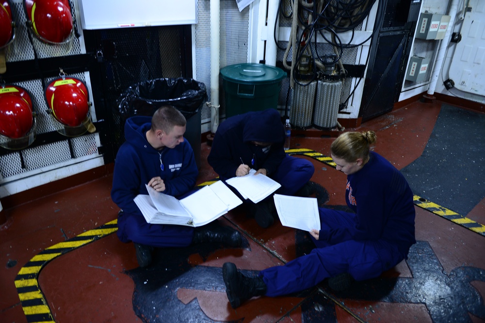 Studying aboard the Coast Guard Cutter Midgett