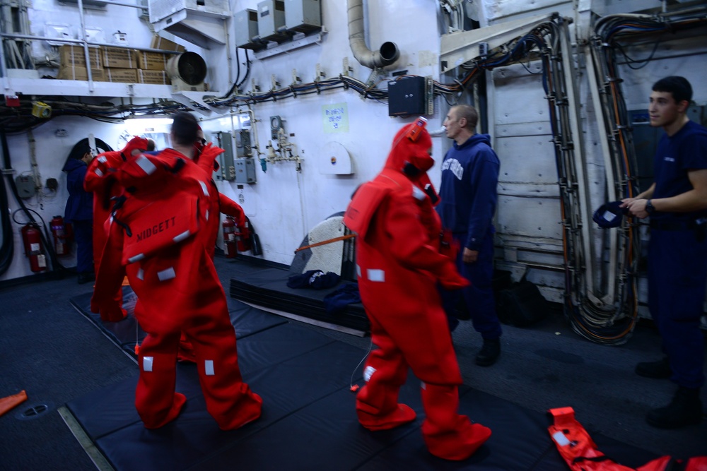 Emersion suit training aboard the Coast Guard Cutter Midgett