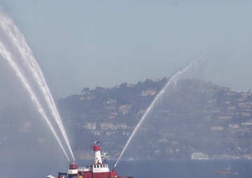 Parade of ships sail through San Francisco Bay