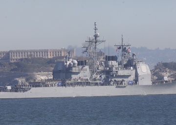 Parade of ships sail through San Francisco Bay