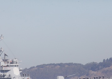 Parade of ships sail through San Francisco Bay