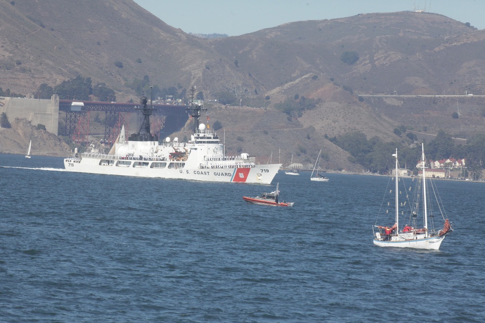 Parade of ships sail through San Francisco Bay