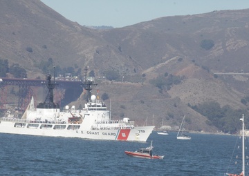 Parade of ships sail through San Francisco Bay