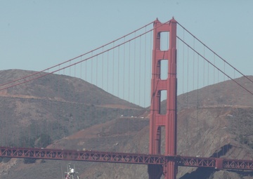 Parade of ships sail through San Francisco Bay