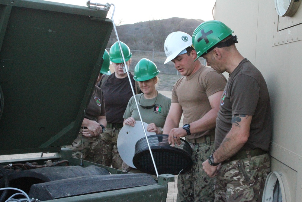 US Navy sailors train British Army soldiers in expeditionary medical training