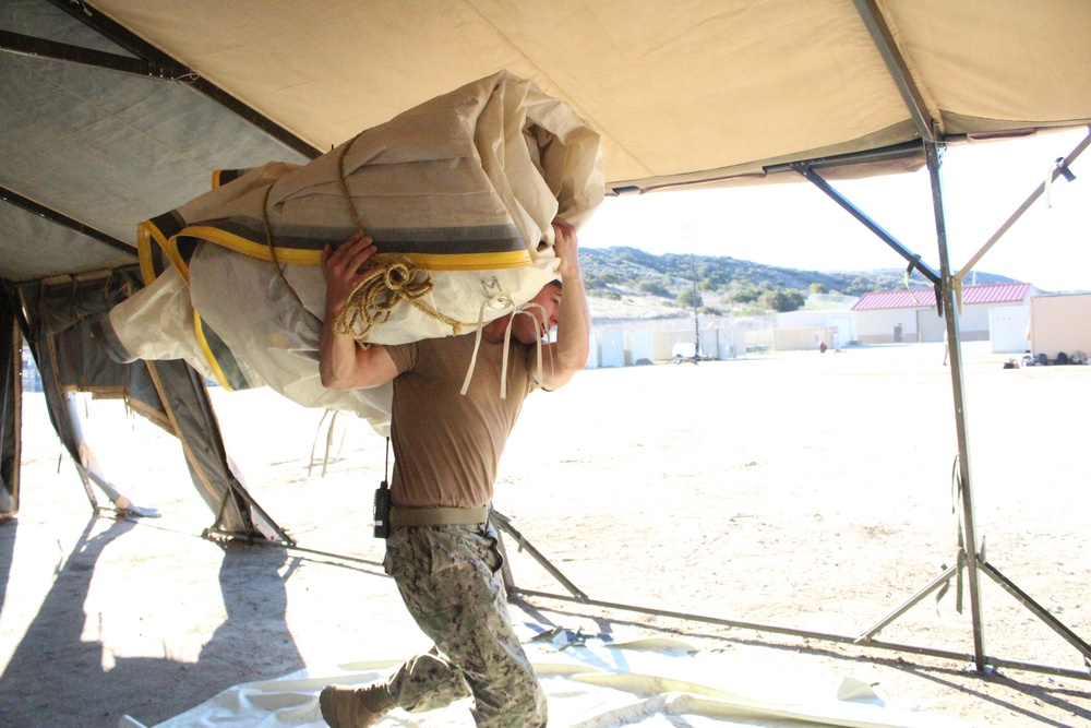 US Navy sailors train British Army soldiers in expeditionary medical training