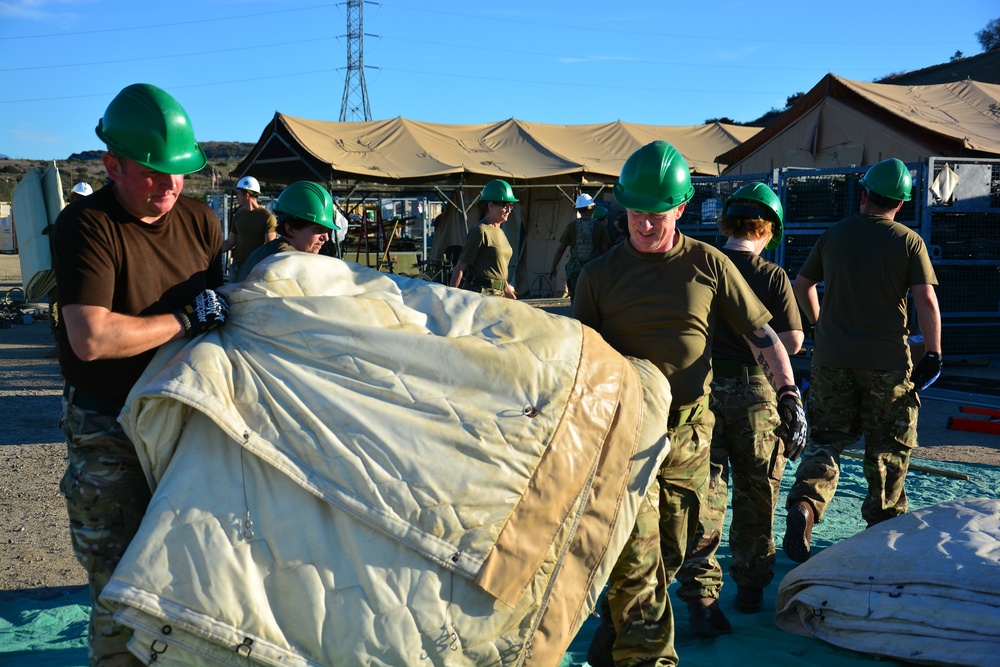 US Navy sailors train British Army soldiers in expeditionary medical training