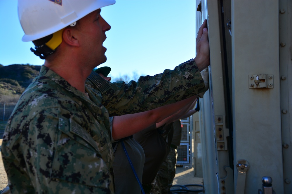 US Navy sailors train British Army soldiers in expeditionary medical training