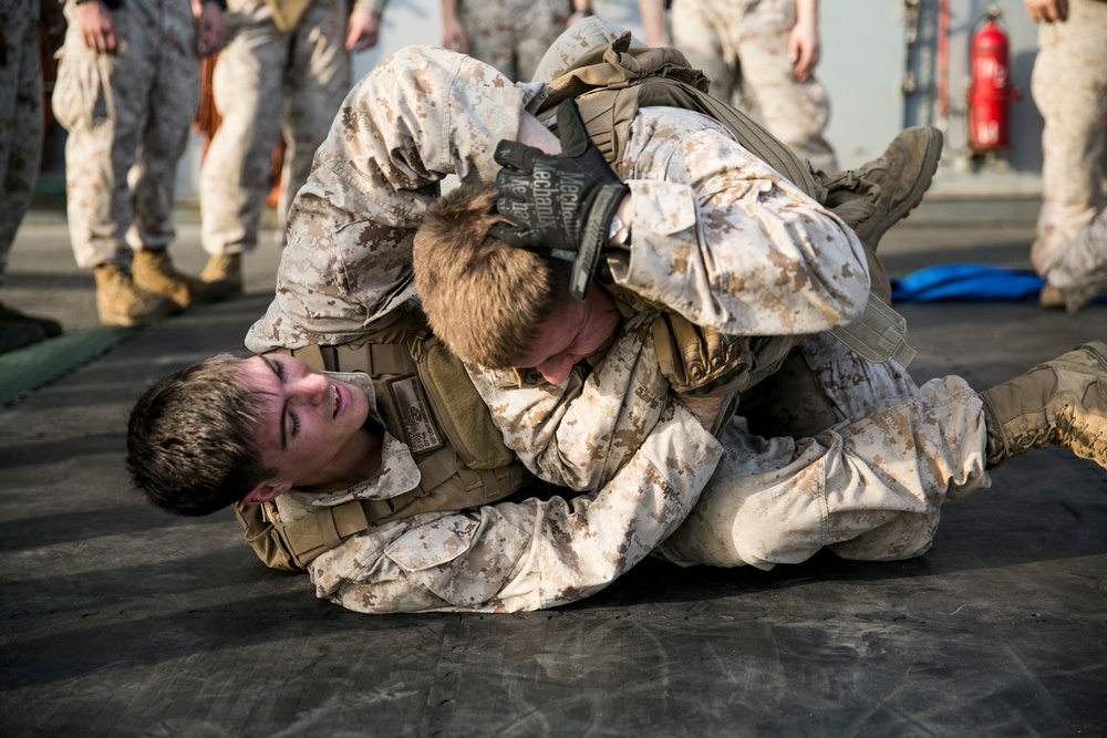 U.S. Marines run, fight, and fire