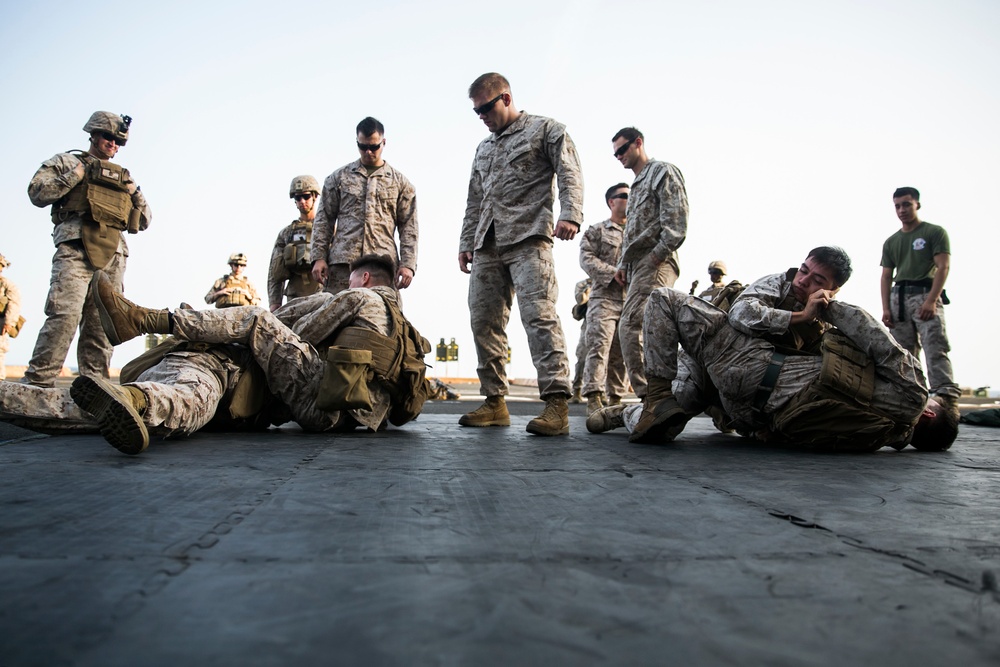 U.S. Marines run, fight, and fire