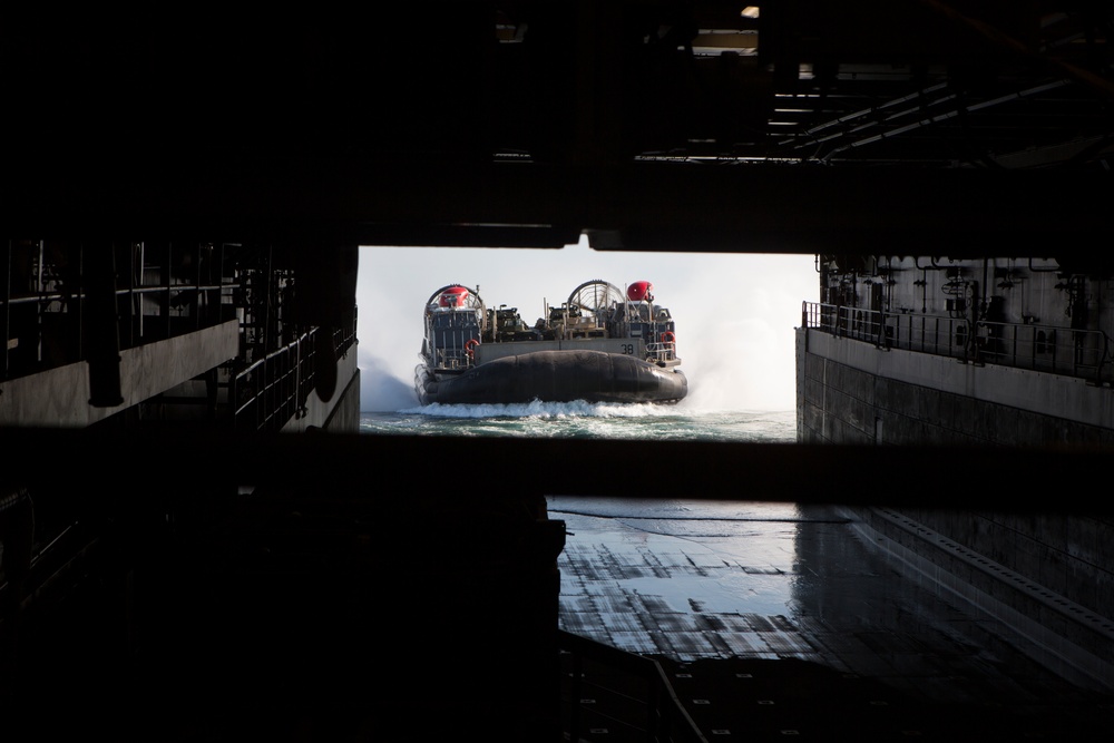 USS Arlington prepares for departure