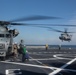 USS Arlington prepares for departure
