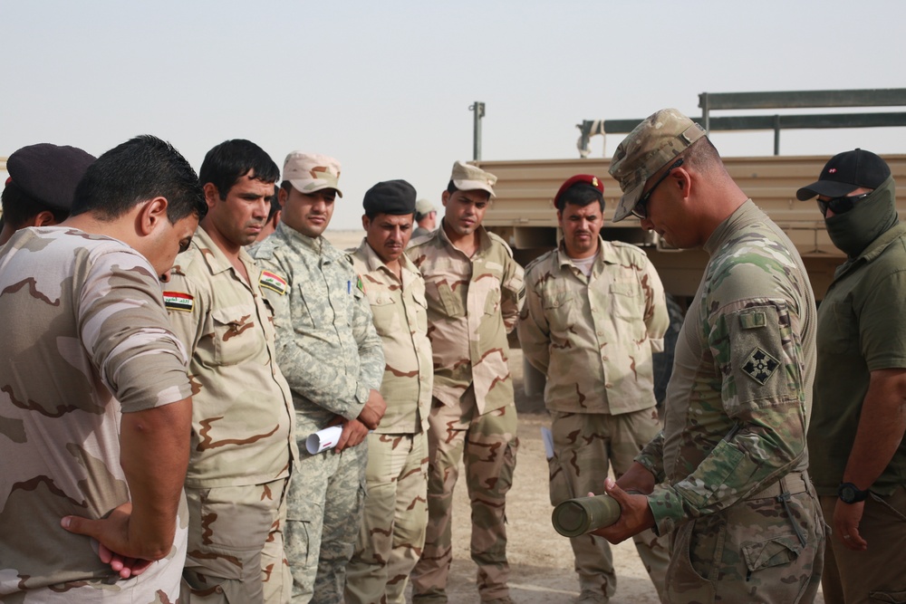 US Army combat engineers train Iraqi army to use Bangalore torpedoes