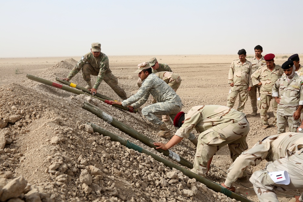 US Army combat engineers train Iraqi army to use Bangalore torpedoes